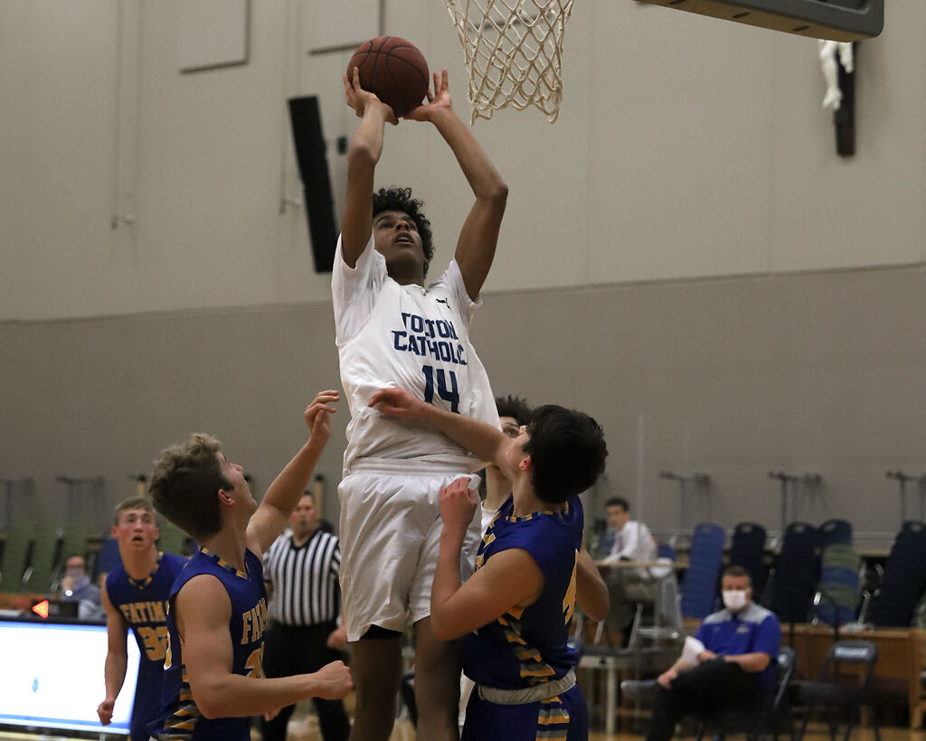 Tolton junior Jevon Porter goes up for a jump shot